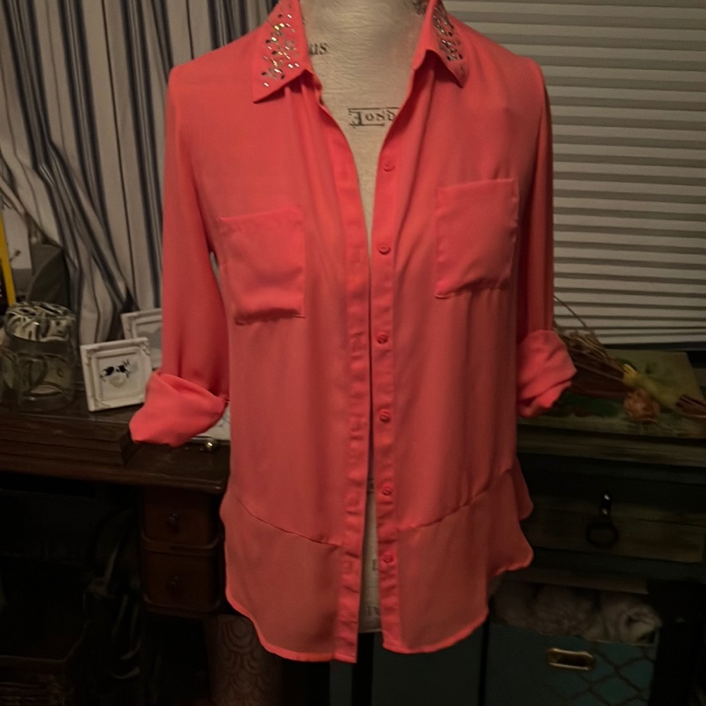 Fun coral color blouse with some bling on collar